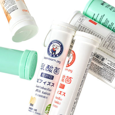 2024 製品 カラフル カスタマイズされたデザイン PP 空っぽ 発泡錠 トップ付きチューブ